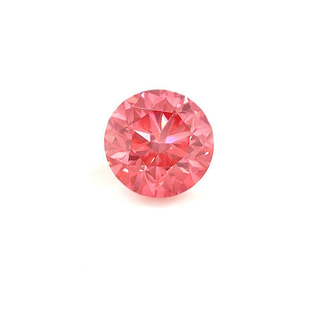 The 1.50 Carats Round 7mm Premium Rose Pink Diamond is displayed on a white background, highlighting its dazzling brilliance and precise, symmetrical cut.
