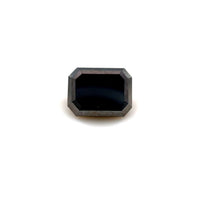 The 2.10 carats Emerald 8.0x6.1 Premium Black Diamond, featuring beveled faceted edges, is showcased centered on a white background, highlighting the allure of this natural gemstone.