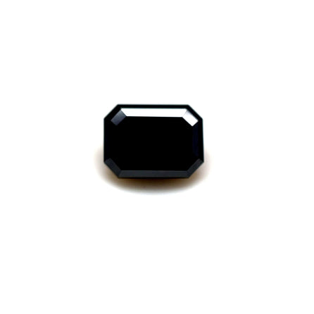 A 2.05 carats emerald-cut premium black diamond (8.0x6.0mm) with beveled edges is centered on a plain white background.