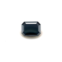 A 2.08 carat Emerald7.97x6.06 Premium Black Diamond with reflective facets is displayed on a plain white background, highlighting its striking emerald shape.