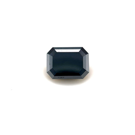 A 2.08 carat Emerald7.97x6.06 Premium Black Diamond with reflective facets is displayed on a plain white background, highlighting its striking emerald shape.