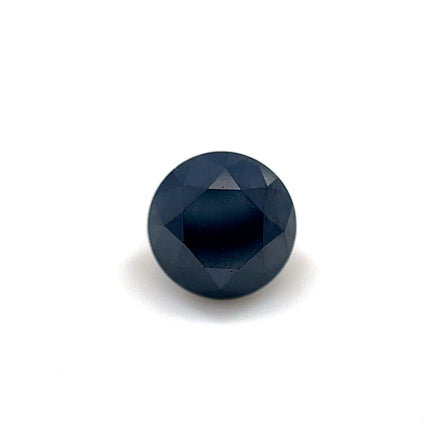 A 1.41 carat round (6.40 x 6.40 x 5.22 mm) premium black diamond is displayed centered on a plain white background.