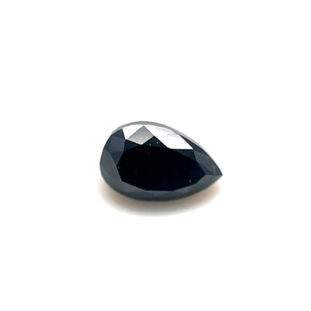 A 1.24 carat premium black diamond, pear-shaped and measuring 7.81 x 4.89 x 3.85 mm, is displayed against a white background.