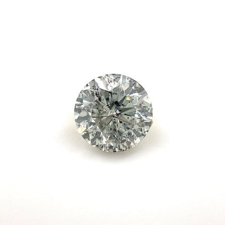 The 6.81 x 6.81 x 4.29 Fine Salt & Pepper Diamond, round brilliant cut, is showcased on a plain white background, highlighting its unique inclusions, sparkling clarity, and intricate reflective surfaces.