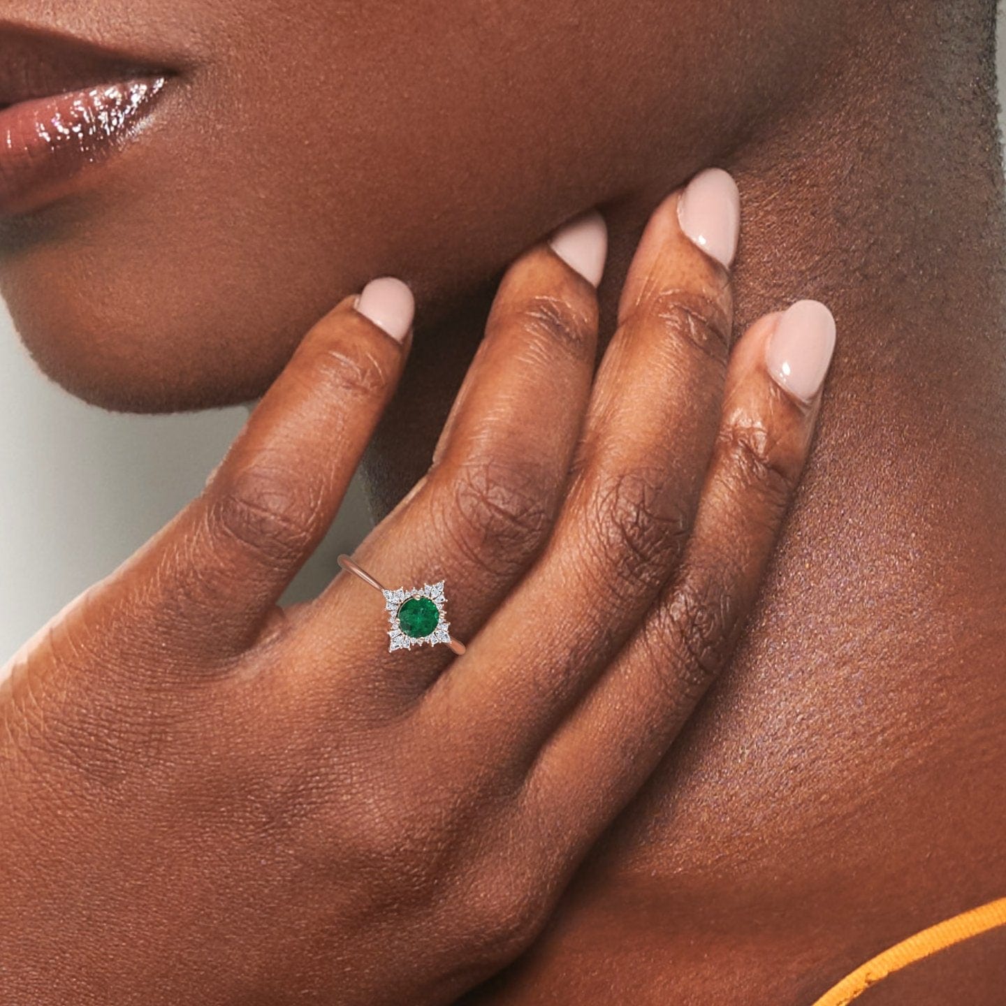 0.47-carat Emerald & Diamond Vintage-Inspired Starburst Ring in 18K Rose gold, Delia style, hand view