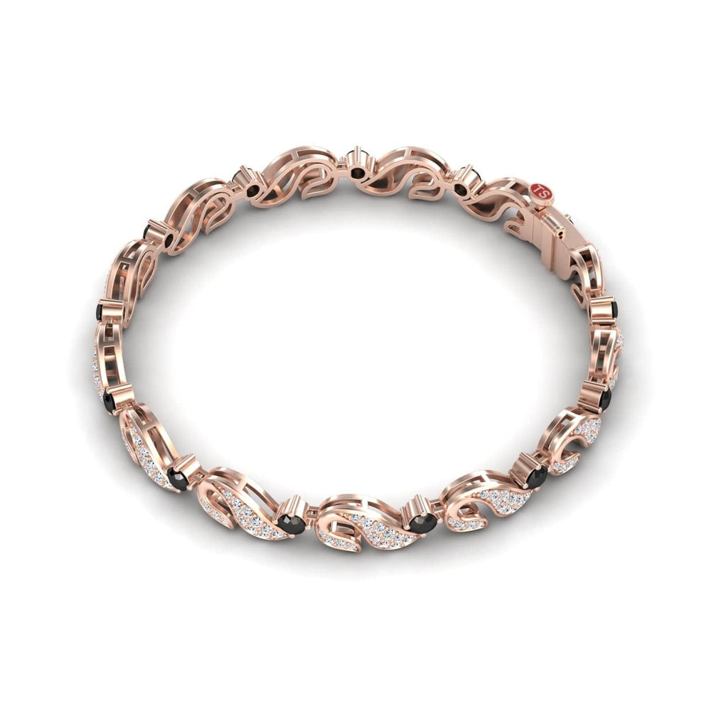 The Black & White Diamond Swirl Link Bracelet - Elizabeth features interlocking swirl links, some adorned with sparkling black and white diamonds, displayed on a white background.