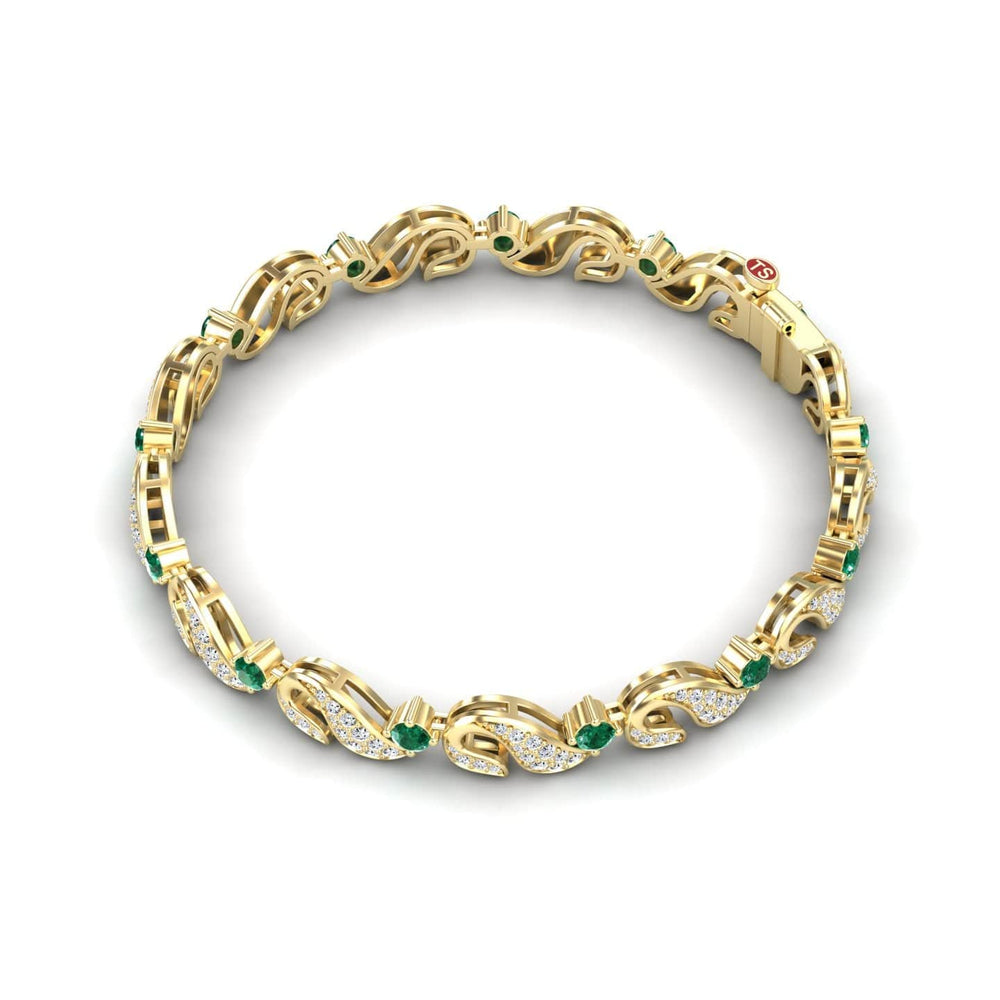 The Emerald & Diamond Swirl Link Bracelet - Elizabeth features an interlocking gold design with green gemstones and sections encrusted with white diamonds, beautifully displayed on a white background.