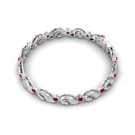 The Ruby & Diamond Swirl Link Bracelet - Elizabeth features an intricate silver design with alternating sparkling white diamonds and red rubies in an elegant, looped pattern.