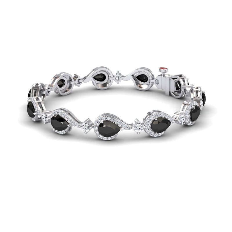 The Black & White Diamond Tennis Bracelet - Gemma features oval black gemstones framed by clear stones in a wavy, elegant pattern, with a secure clasp and sophisticated polished design.