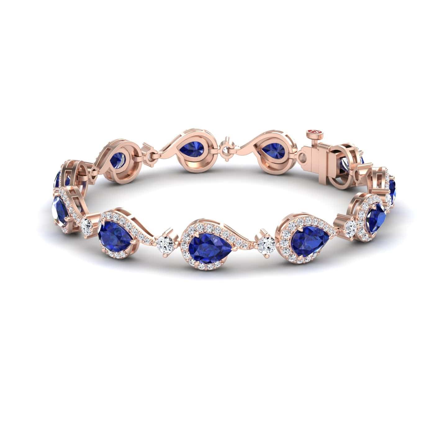 The Blue Sapphire & Diamond Tennis Bracelet - Gemma features teardrop-shaped blue sapphires encircled by sparkling diamonds, linked in an elegant rose gold design with a secure clasp.