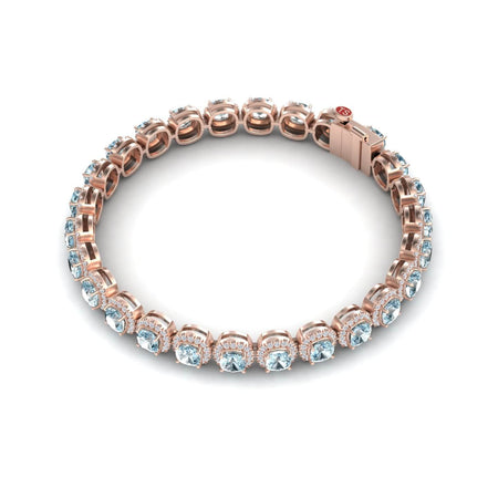 The Aquamarine & Diamond Halo Tennis Bracelet - Isabella features sparkling gemstones in prong settings, showcased on a white background.