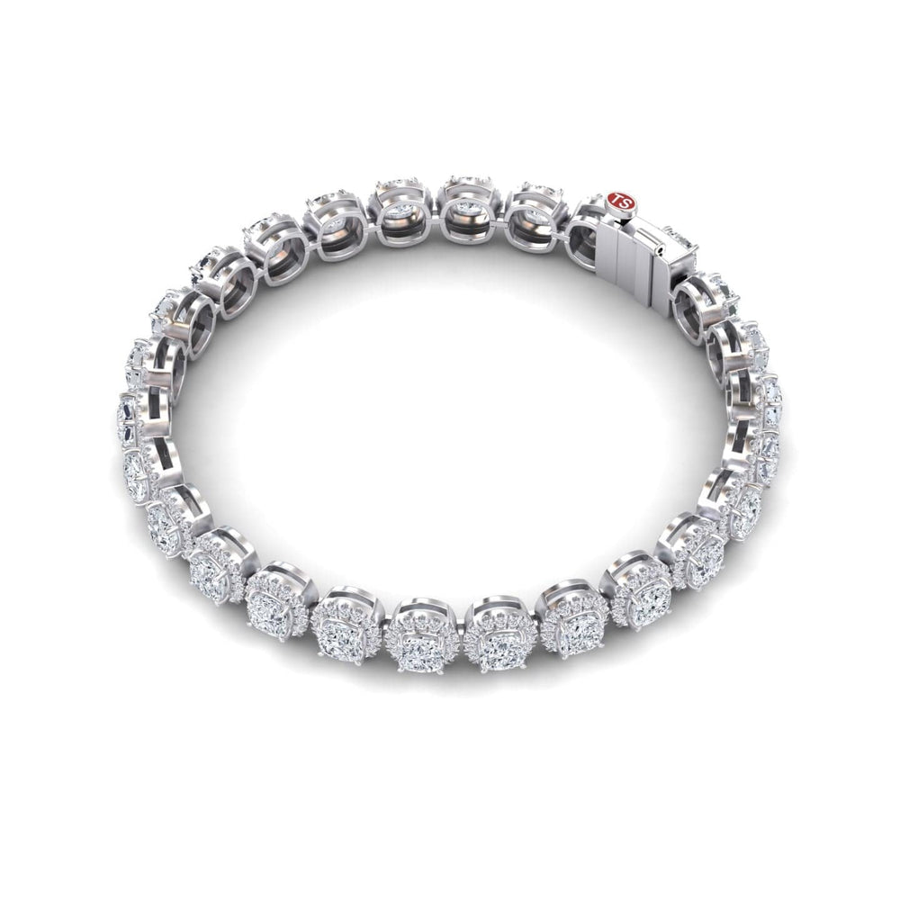 The Lab Grown Diamond Halo Tennis Bracelet - Isabella features round, cluster-set diamonds in individual white gold links, displayed in a circular shape on a white background.