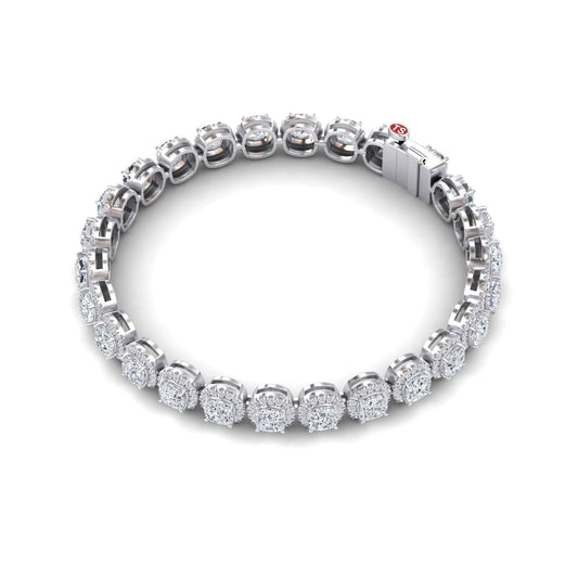 The Lab Grown Diamond Halo Tennis Bracelet - Isabella features round, cluster-set diamonds in individual white gold links, displayed in a circular shape on a white background.
