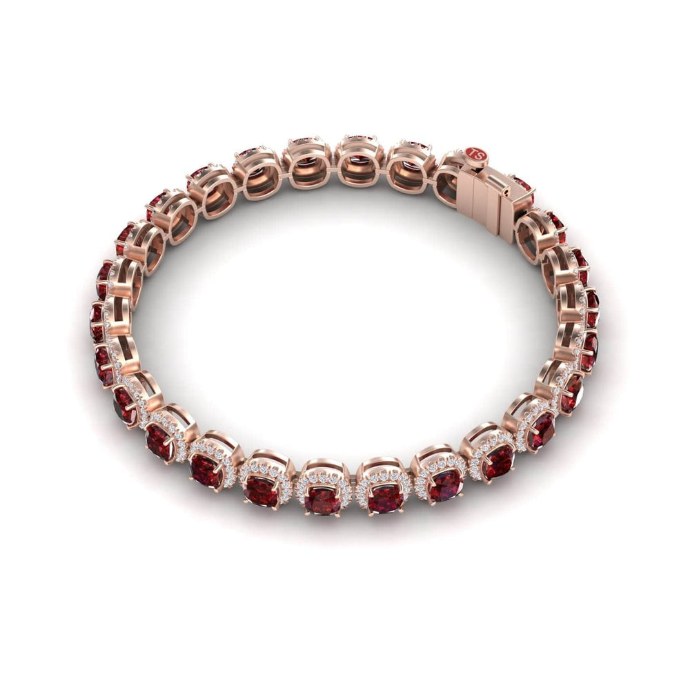 The Lab Grown Ruby & Diamond Halo Tennis Bracelet - Isabella features alternating round rubies and white diamonds in rose gold, set in a continuous loop with a box clasp, displayed on a white background.