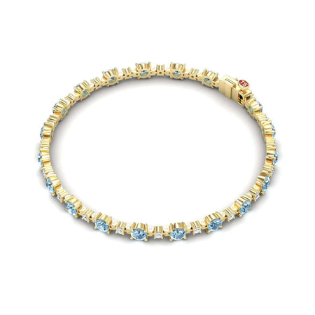 The Aquamarine & Diamond Tennis Bracelet - Natalia features evenly spaced round aquamarine gemstones set in prongs, accented with diamonds, and secured with a clasp.