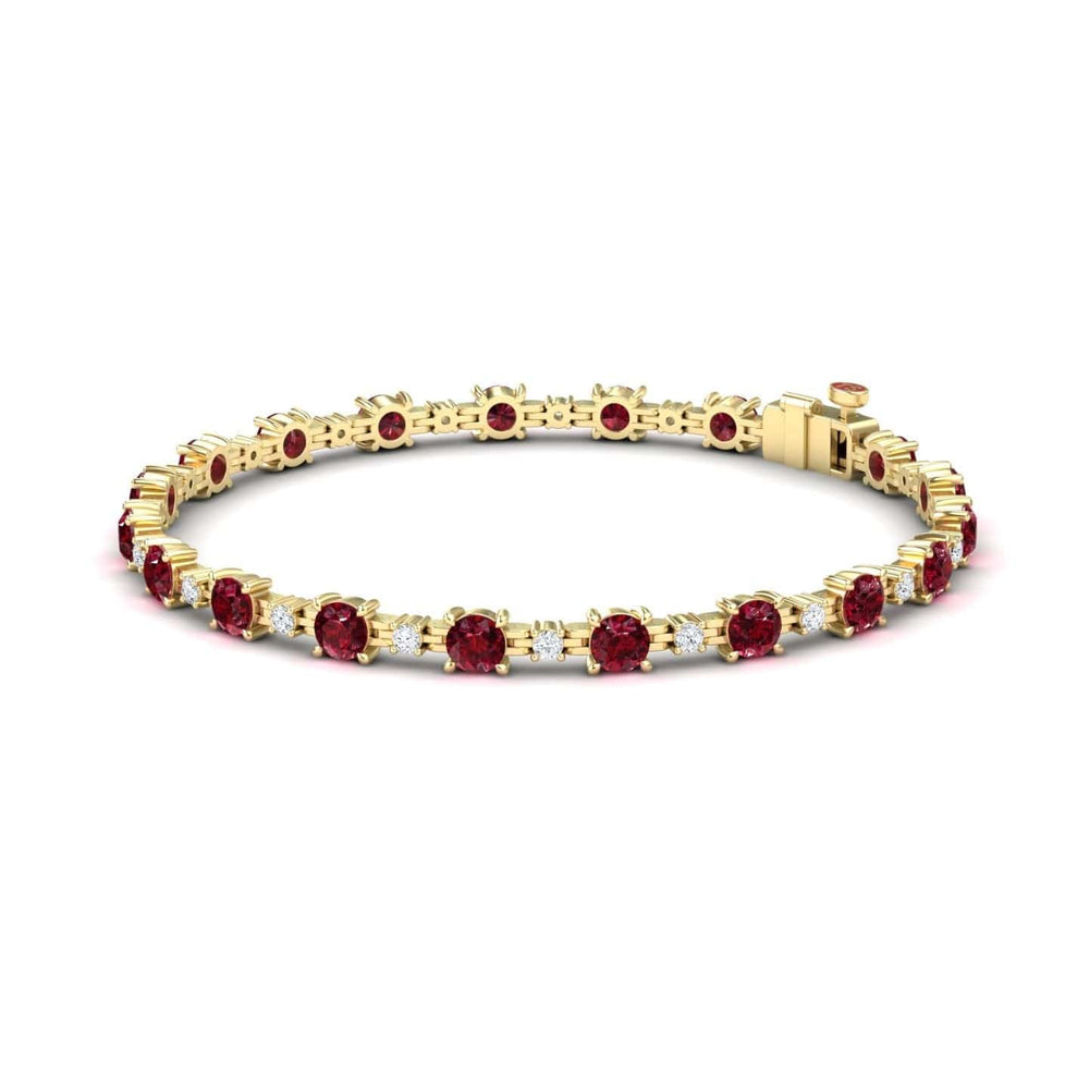 The Ruby & Diamond Tennis Bracelet - Natalia features round red gemstones set evenly along a gold band with a secure clasp.
