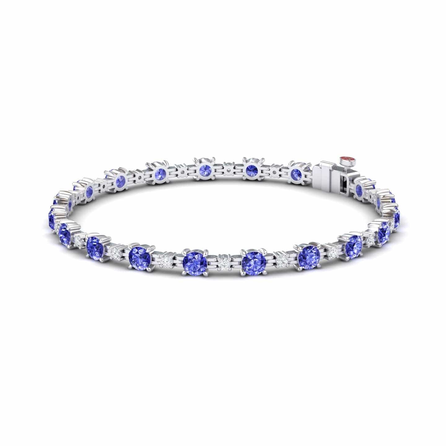 The Tanzanite & Diamond Tennis Bracelet - Natalia is a silver bracelet with evenly spaced round violet-blue tanzanite gemstones in prong settings, shown on a white background.