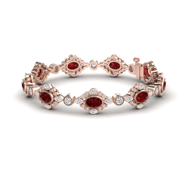 The Ruby & Diamond Vintage-Inspired Tennis Bracelet - Ariana features oval red gemstones and round white diamonds in an ornate rose gold design, displayed on a white background.