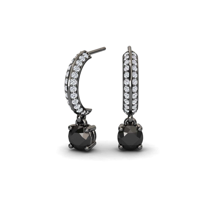 The Serena Black & Diamond Pave Drop Hoop Earrings feature black metal hoops with small clear gemstones and a single round black gemstone dangling from each.