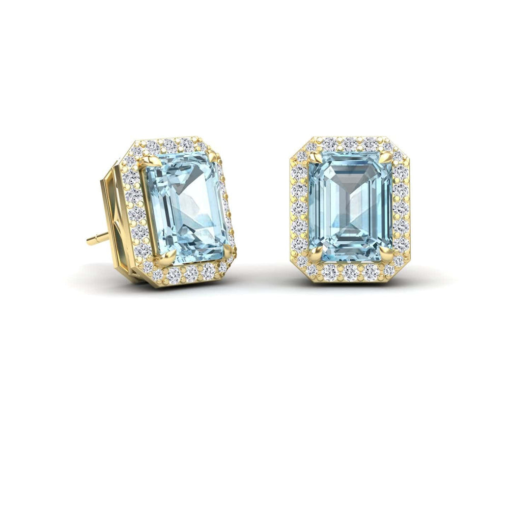 Emerald-cut aquamarine and diamond halo stud earrings in 14k yellow gold