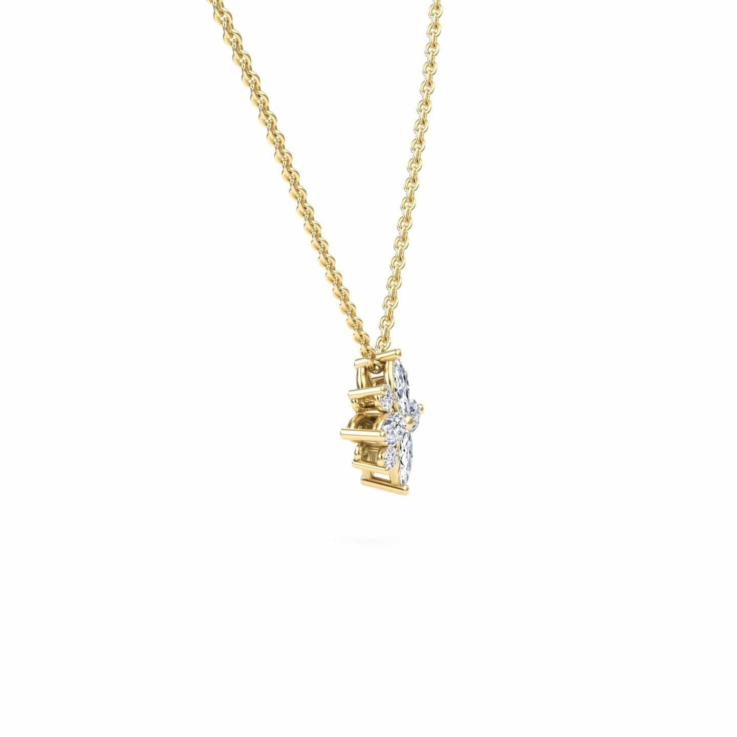 The White Diamond Flower Necklace - Keira features a gold chain and a vertical floral pendant adorned with sparkling clear stones, set in gold, shown from a side angle against a white background.