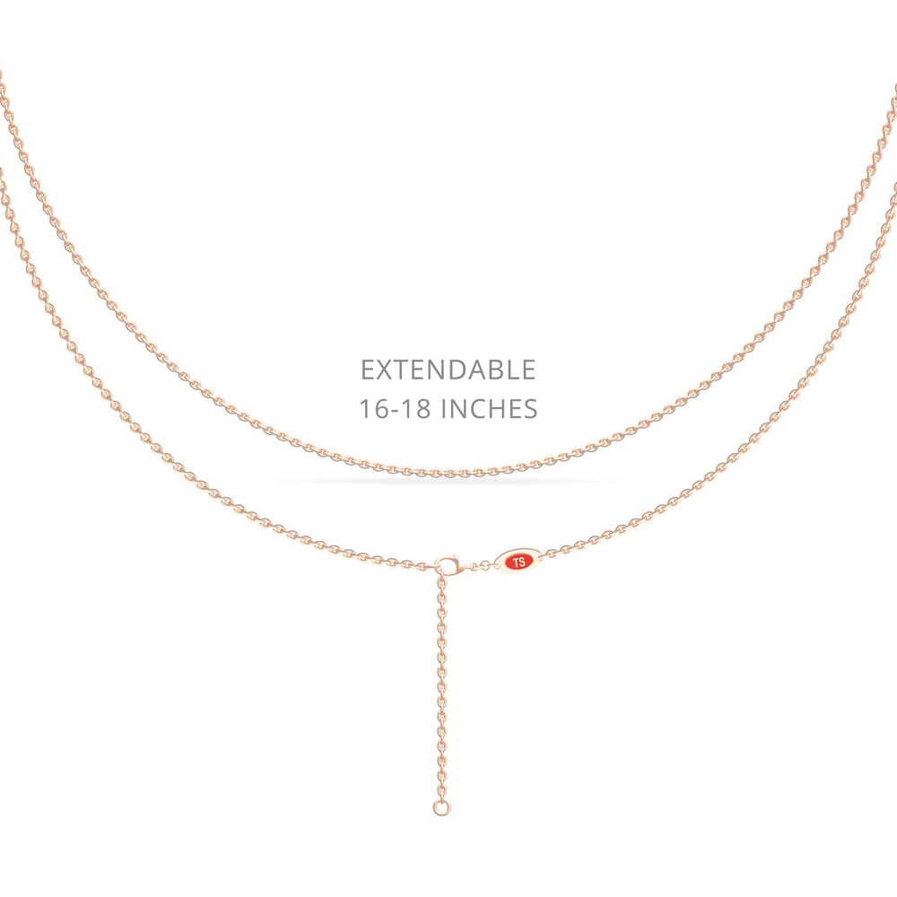 The Emerald & Diamond Flower Necklace - Keira features a delicate gold chain with an adjustable extender for 16 to 18 inch lengths, displayed on a white background with "EXTENDABLE 16-18 INCHES" in gray text.