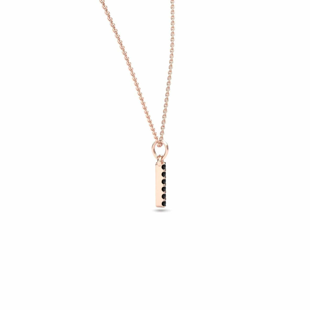 The Black Diamond Vertical Bar Necklace - Lalita is a delicate rose gold necklace with a vertical rectangular pendant featuring a row of small black diamonds on one side, shown against a plain white background.