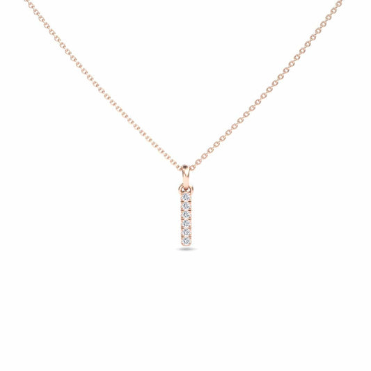 The White Diamond Vertical Bar Necklace - Lalita features a delicate gold chain and a vertical bar pendant set with five sparkling white diamonds in a row, displayed against a plain white background.