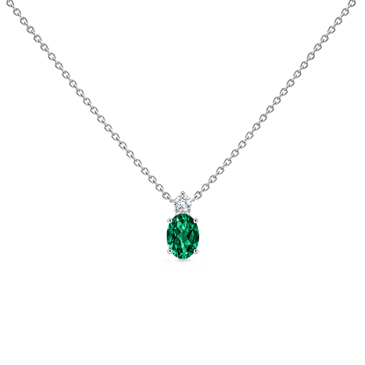 Lab-grown emerald and diamond oval solitaire necklace in 14k white gold