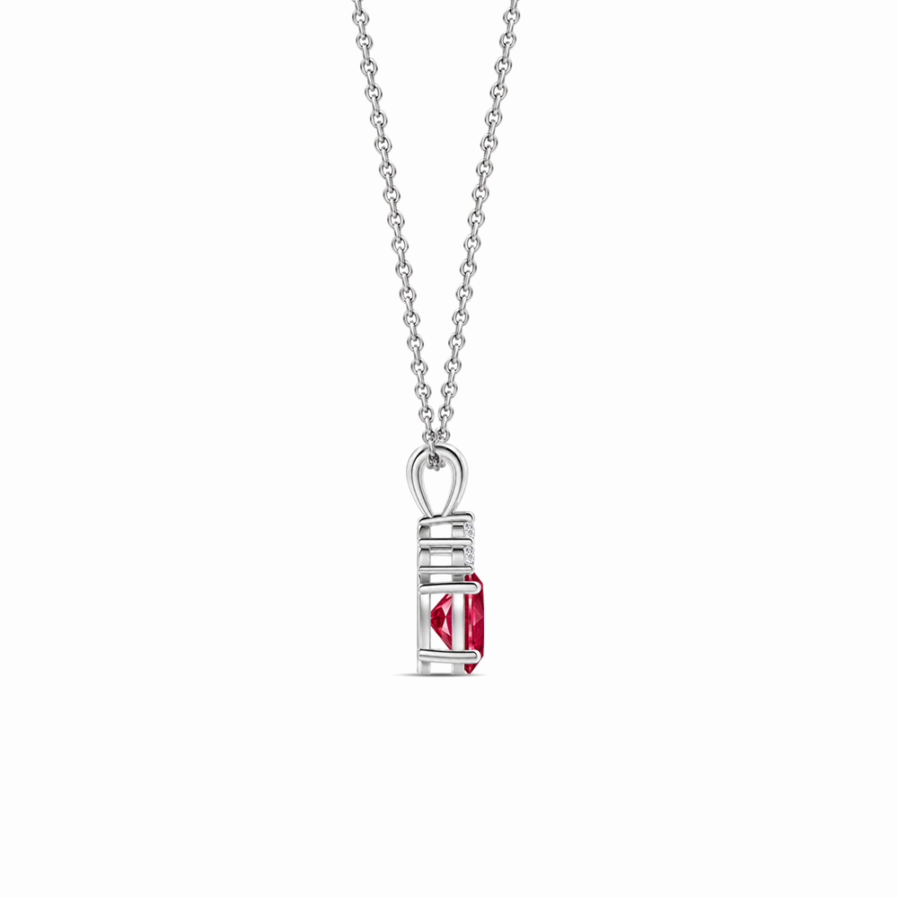 Lab-grown ruby and trio diamond oval solitaire necklace in 14k white gold, view 2