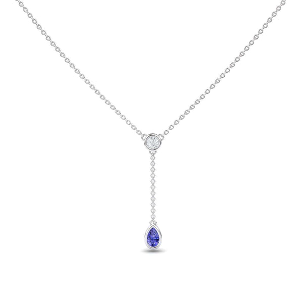 The Tanzanite & Diamond Elegant Drop Necklace - Daniela features a minimalist silver chain with a central round diamond and a short drop ending in a pear-shaped tanzanite gemstone pendant, offering an elegant and refined look.