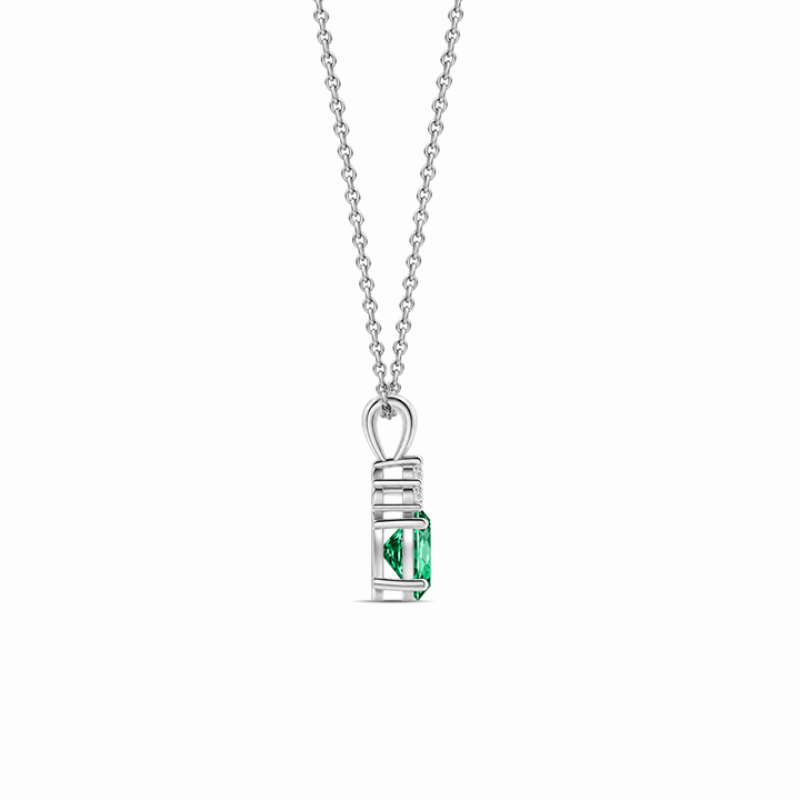 Lab-grown emerald and trio diamond oval solitaire necklace in 14k white gold, view 2