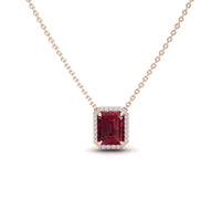 The Ruby & Diamond Halo Necklace - Hilary is a gold chain necklace with a rectangular red gemstone pendant encircled by small white diamonds, shown against a white background.