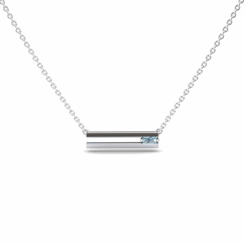 The Aquamarine Bar Necklace - Cecilia features a minimalist silver horizontal bar pendant with a small light blue gemstone on the right, suspended from a delicate chain against a white background.