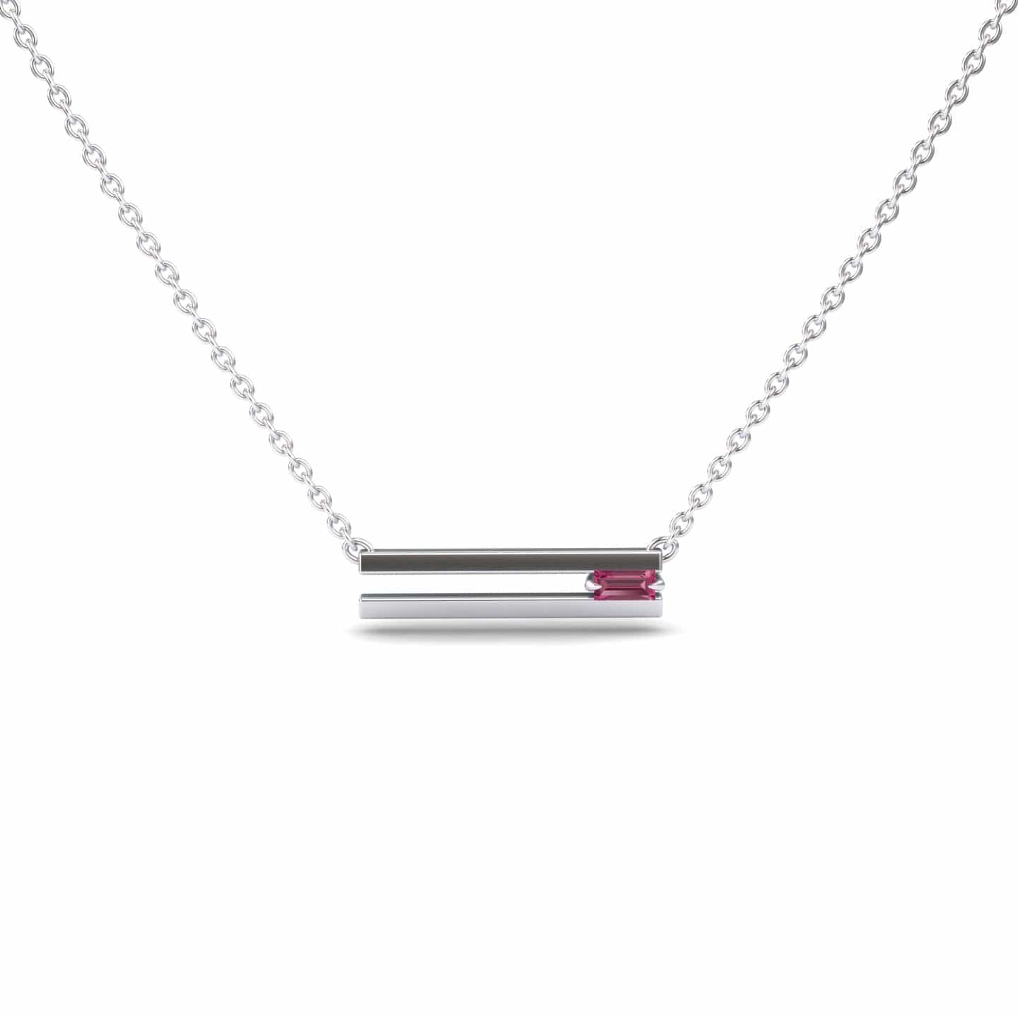 The Pink Tourmaline Bar Necklace - Cecilia features a minimalist silver chain with a horizontal bar pendant, accented by a small pink tourmaline gemstone, shown on a white background.