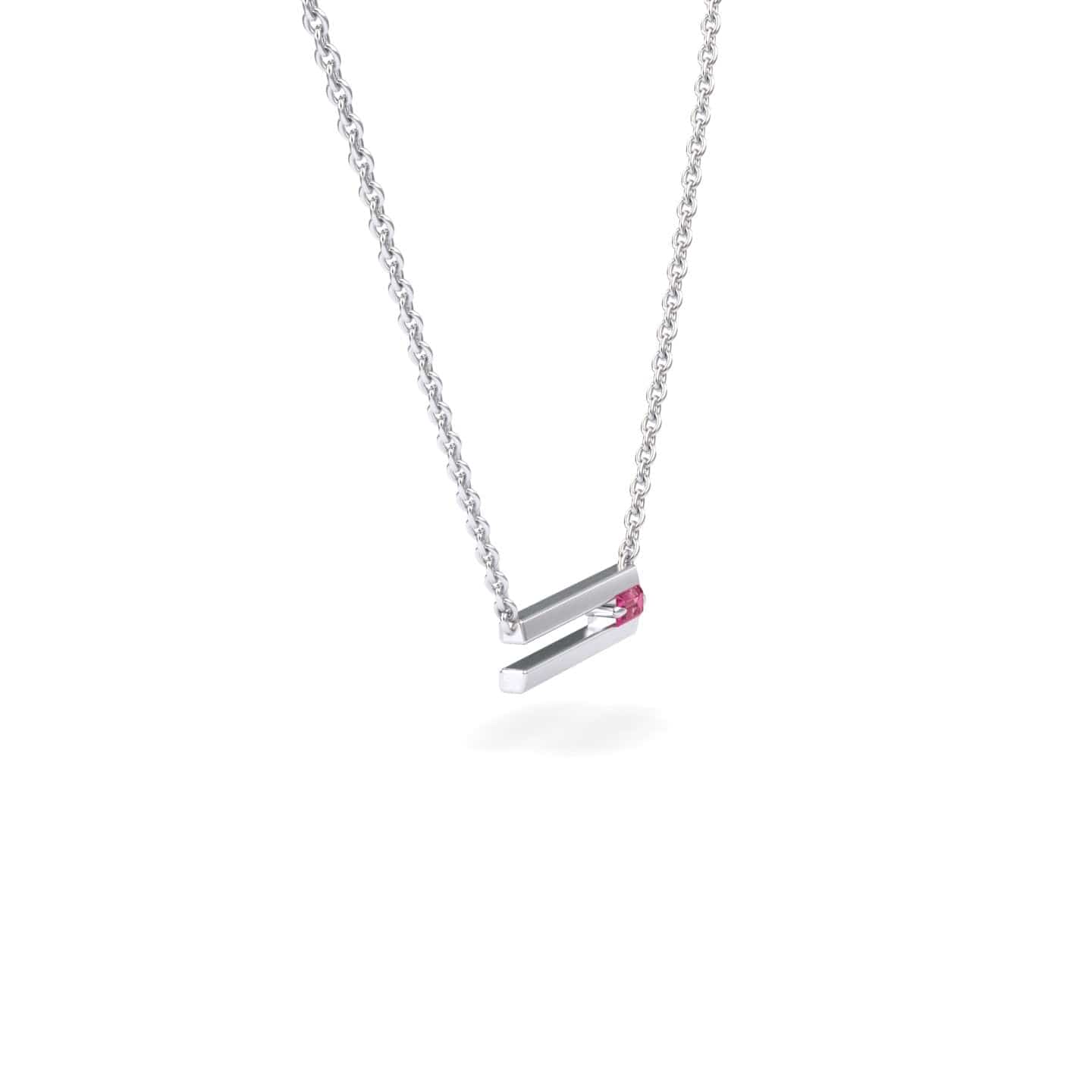 The Pink Tourmaline Bar Necklace - Cecilia is a silver chain necklace with a minimalist bar pendant featuring a small pink tourmaline gemstone set near one end.