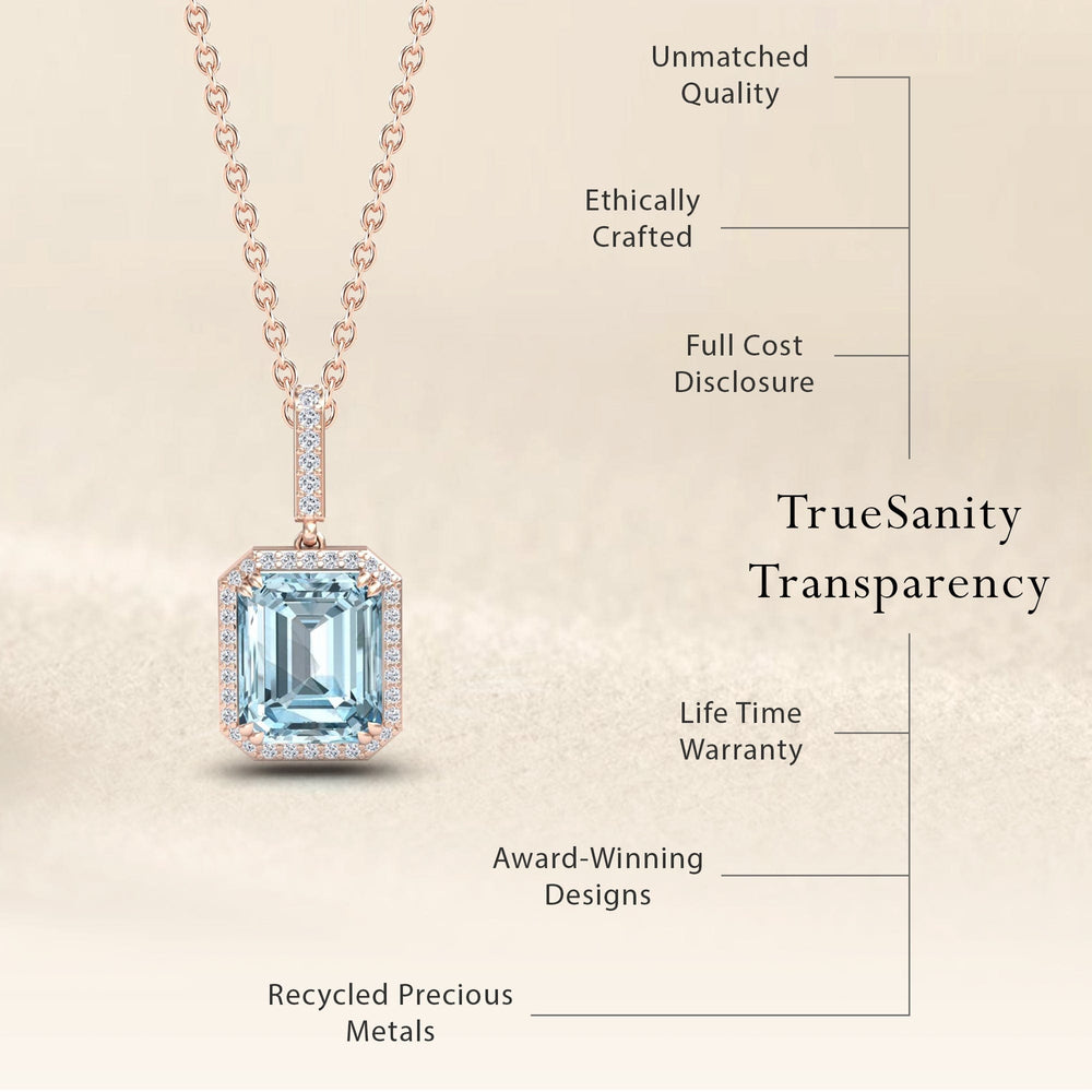 The Sky Blue Topaz & Diamond Halo Necklace - Sanya is shown in rose gold with a large emerald-cut topaz pendant. Features: unmatched quality, ethically crafted, full cost disclosure, lifetime warranty, award-winning design, recycled metals.