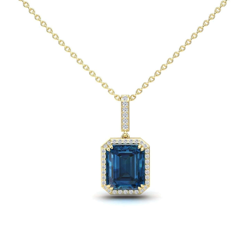 The London Blue Topaz & Diamond Halo Necklace - Sanya features a gold chain with a square-cut blue topaz pendant, surrounded by white diamonds and accented with more diamonds on the bail.
