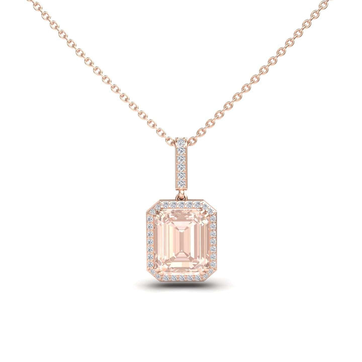 The Morganite & Diamond Halo Necklace - Sanya features a rectangular emerald-cut light pink morganite pendant, surrounded by sparkling diamonds and set on a delicate rose gold chain.