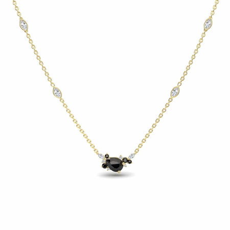The Black & White Diamond Bouquet Necklace - Daria showcases a delicate gold chain with a central black gemstone encircled by white and black stones, plus four evenly spaced white stones along the chain.
