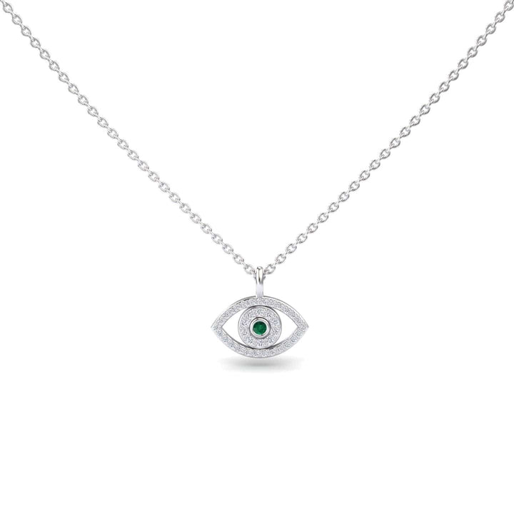 The Emerald & Diamond Eye Necklace - Elise is a silver chain necklace with an eye-shaped pendant, featuring a central green gemstone and small clear stones surrounding it.