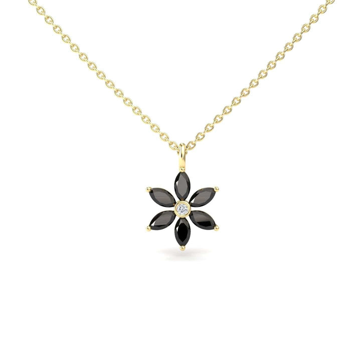 The Black Diamond & Diamond Floral Necklace - Erin features a gold chain with a flower-shaped pendant, six black stones as petals, and a central clear stone.