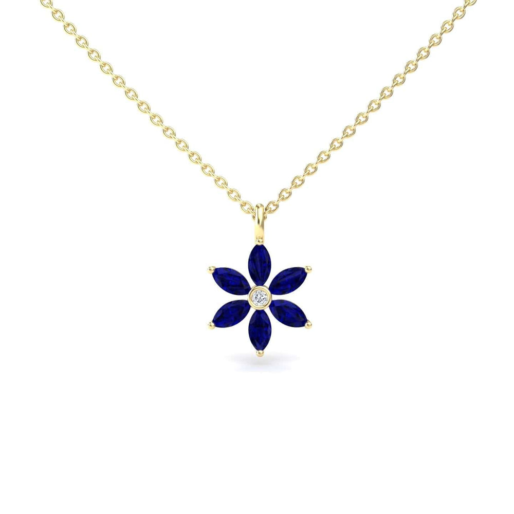 The Lab Grown Blue Sapphire & Diamond Floral Necklace - Erin features a gold chain with a flower-shaped pendant, six blue marquise lab-grown sapphires as petals, and a round lab-grown diamond at the center.