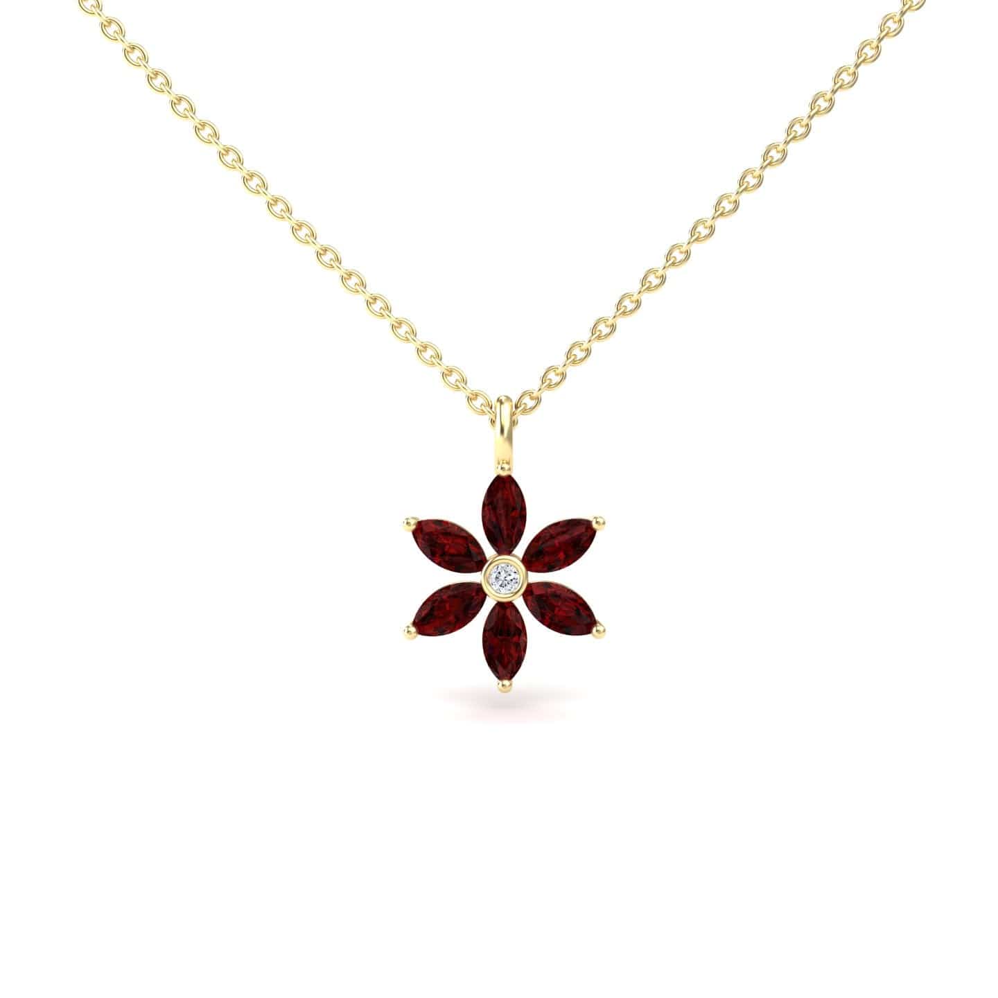 The Lab Grown Ruby & Diamond Floral Necklace - Erin features a gold chain with a flower-shaped pendant adorned with six marquise-cut red rubies as petals and a round diamond at the center.