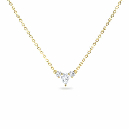The White Diamond Three-Stone Necklace - Jina features a delicate gold chain with a central pendant of three clustered round diamonds in a subtle triangular shape.