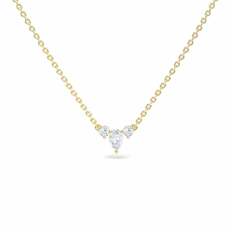 The White Diamond Three-Stone Necklace - Jina features a delicate gold chain with a central pendant of three clustered round diamonds in a subtle triangular shape.
