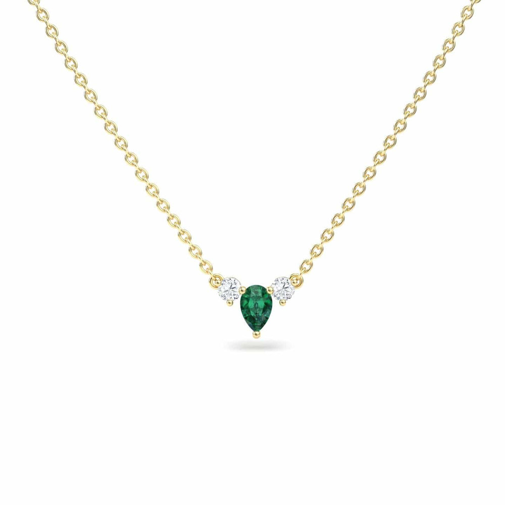 Pear emerald and diamond three-stone necklace in 18k yellow gold