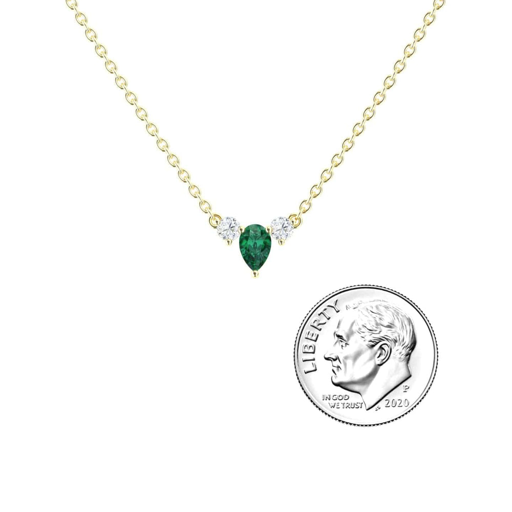 Pear emerald and diamond three-stone necklace in 18k yellow gold, view 2