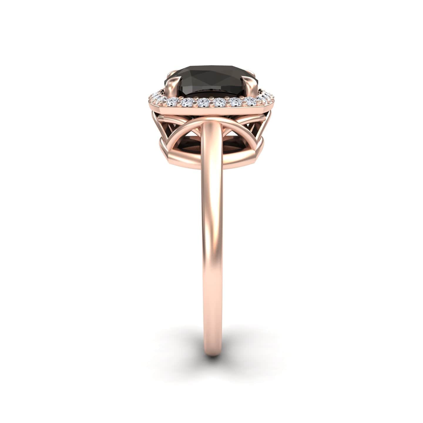 The Black & White Diamond Halo Ring - Ziva features a large oval black gemstone encircled by white diamonds, with a rose gold setting, elegant prongs, and an intricate side gallery design.