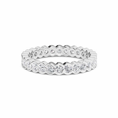 white gold ring with diamond accents on a white background